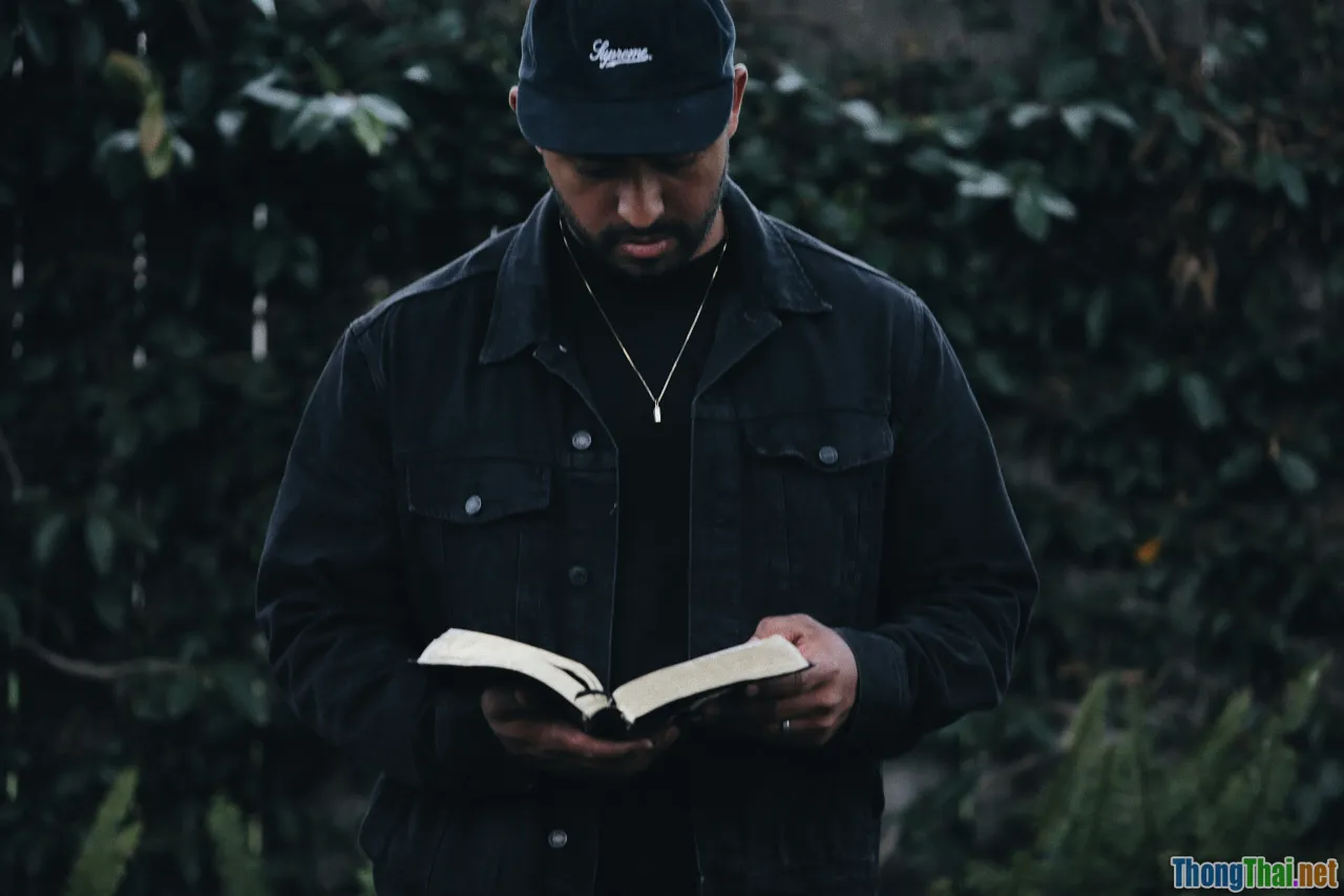 Bible reading, thoughtful man