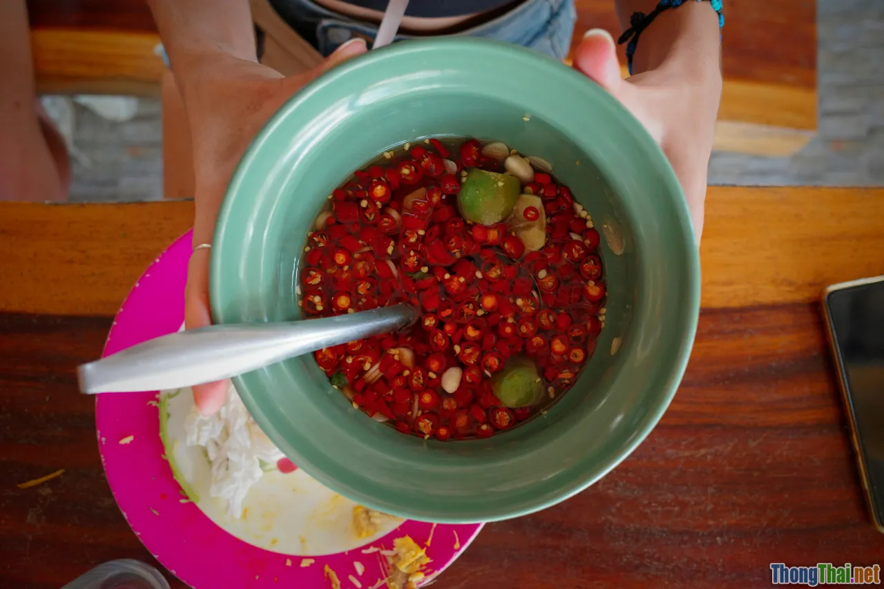 enjoy pho, lime wedge, chili, eating together, ambiance