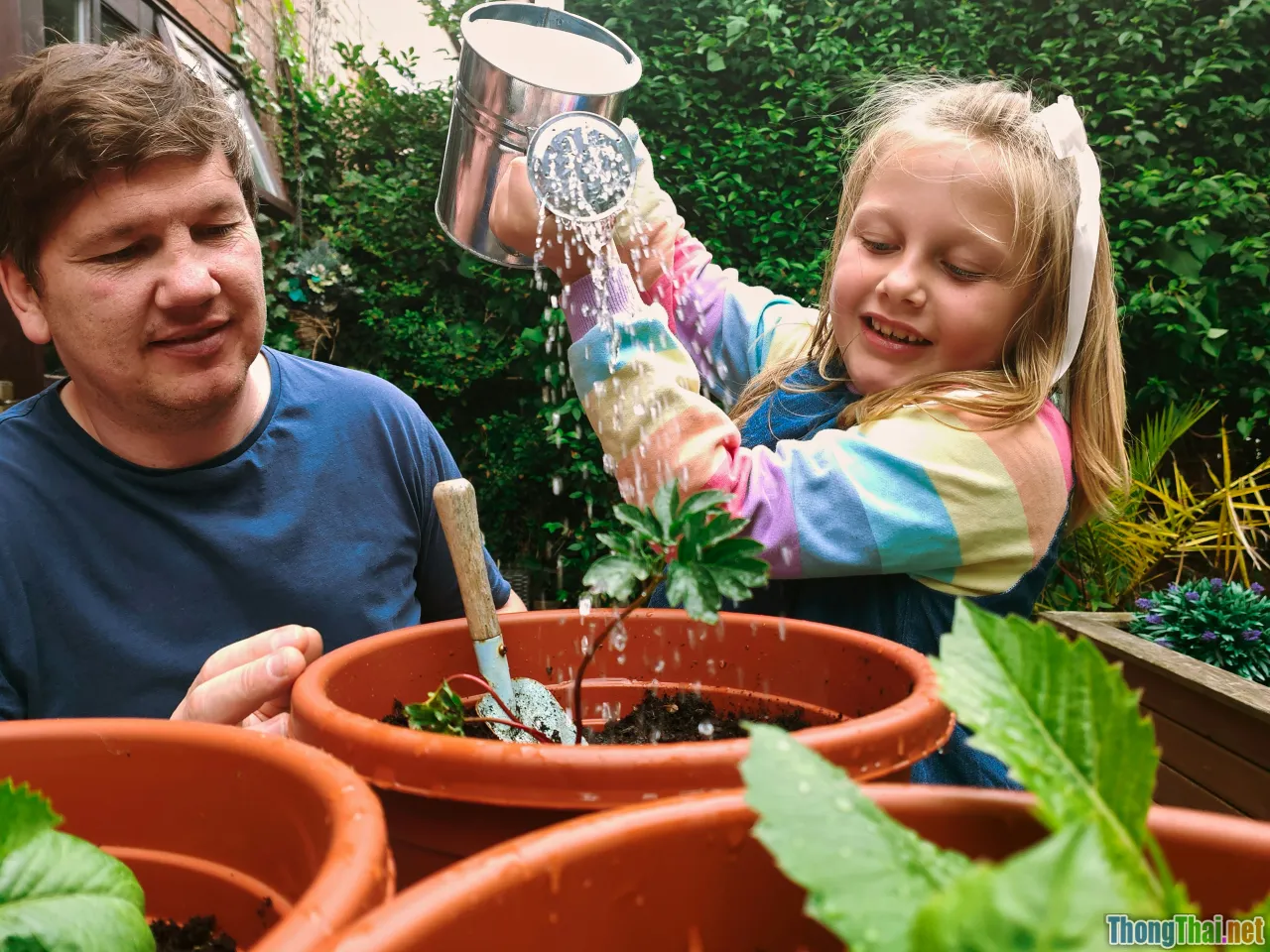family in kitchen, gardening kids