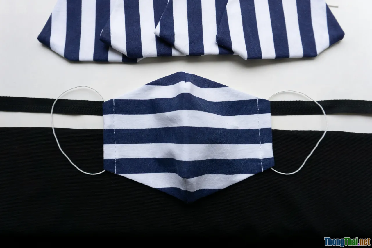 striped shirt, white trousers, coastal summer, clean lines