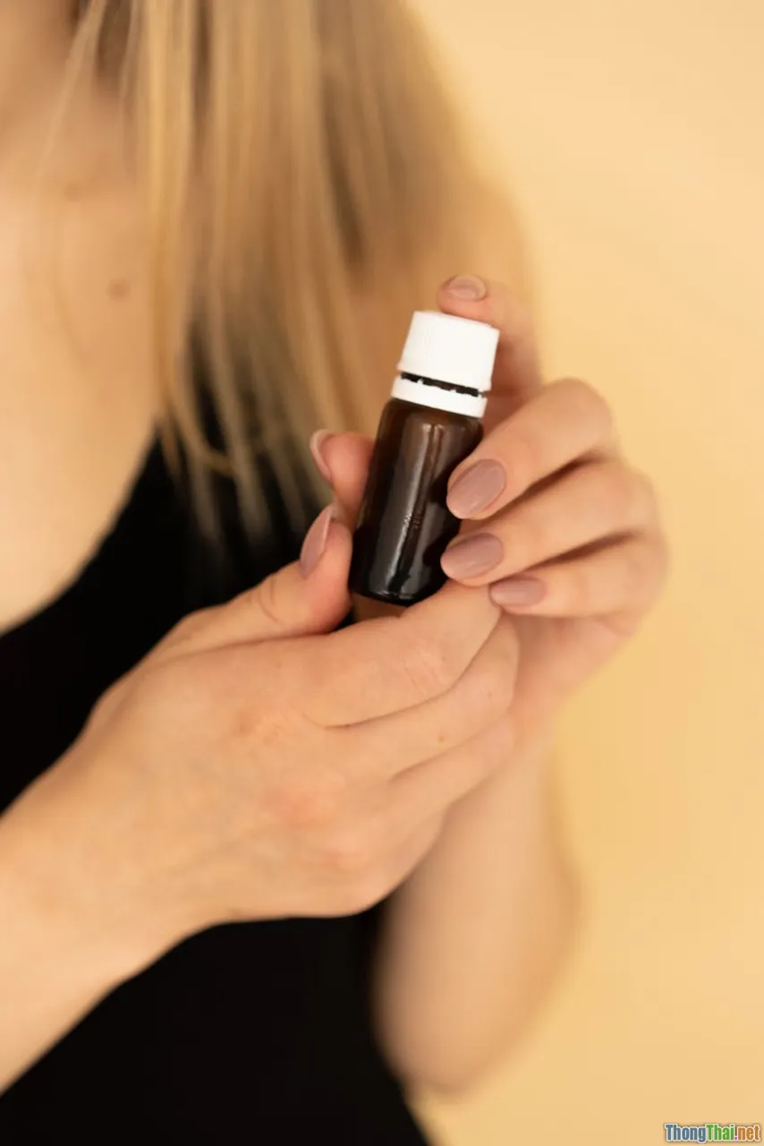 different hair oils, bottles, healthy hair types