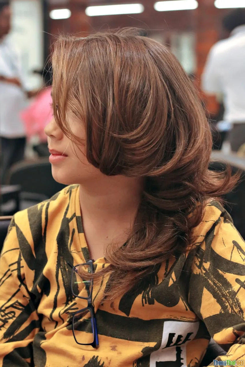 layered haircut, youthful woman