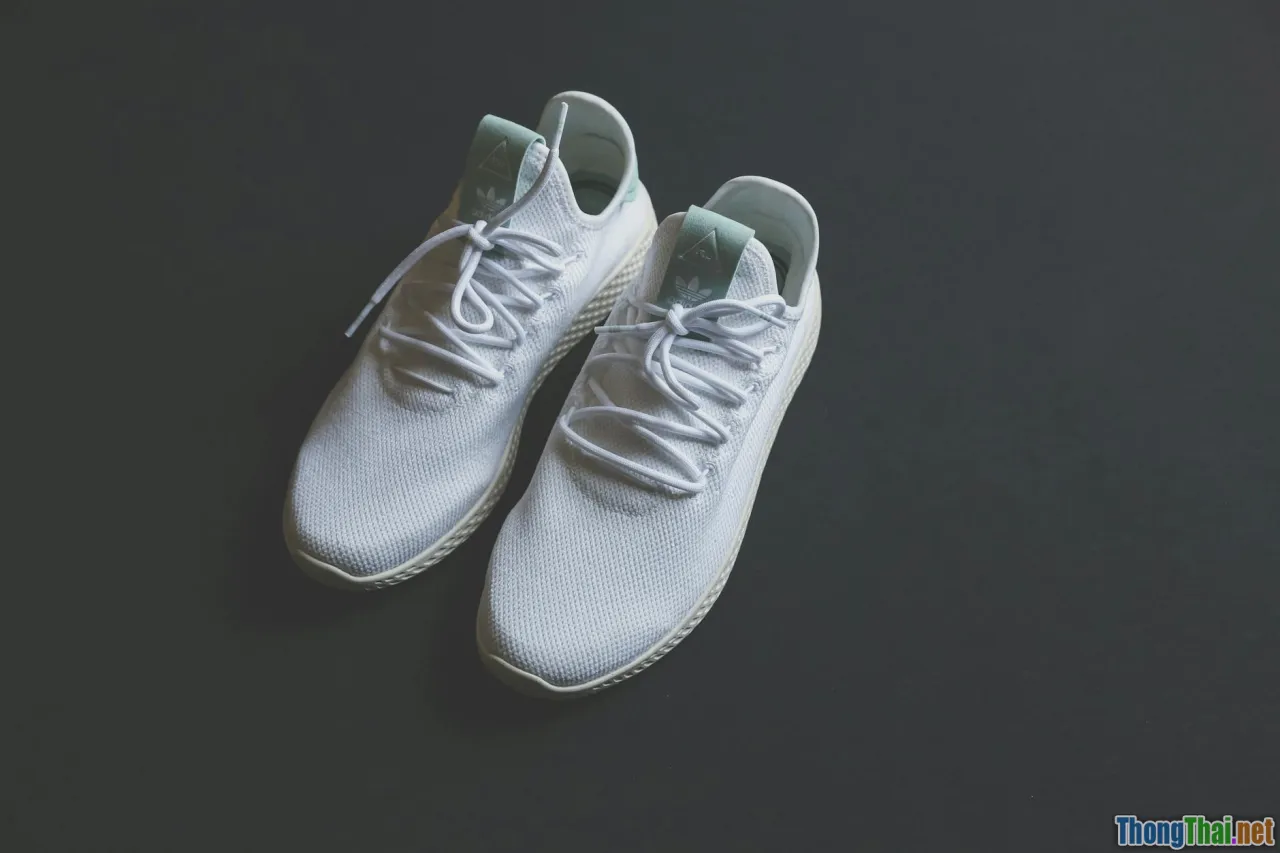 lightweight jumpsuit, minimalist sandals, urban summer, utility style